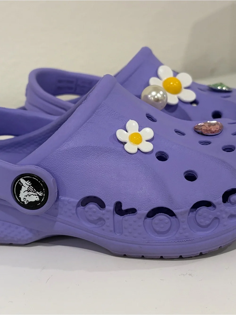 Girls size 9 toddler. Purple CROCS  Great Condition! Charms included